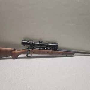 Savage Arms Savage Axis Xp Wood 270 w/ 3x9x40 Scope