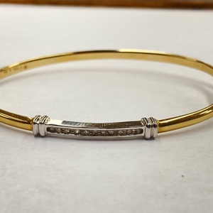 10k 2 Tone Bracelet 3.30 DWT 11 Diamonds .22CTW