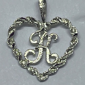  Yellow Gold 14kt Heart K Pendant 0.56dwt